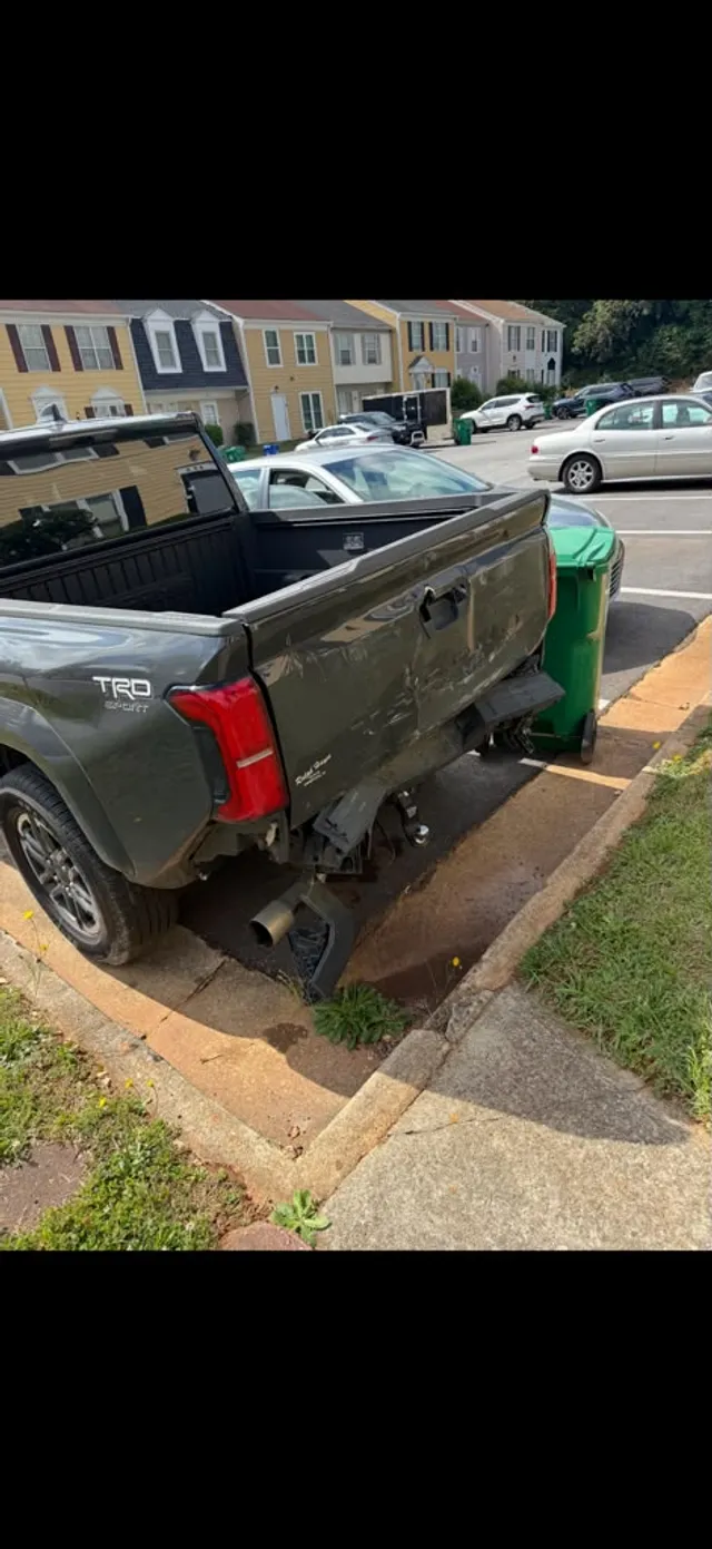 Green truck — collision before — Stop N Go auto body & paint, Stone Mountain GA