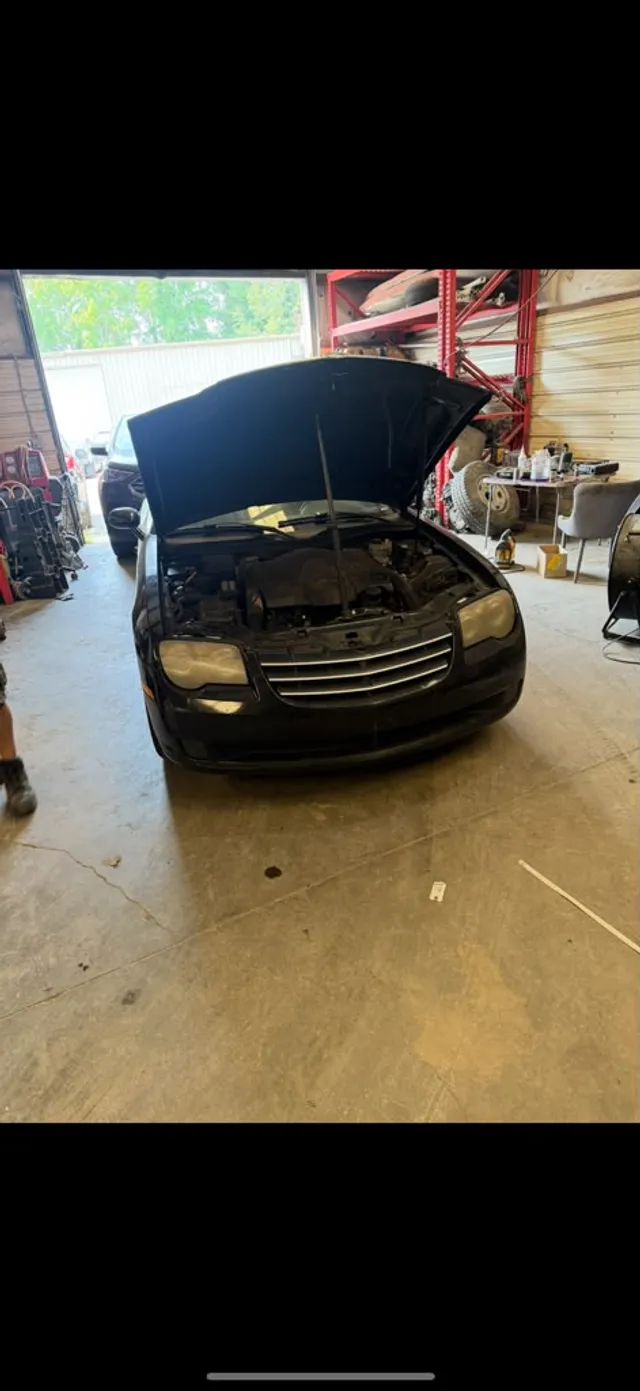 Black coupe — other before — Stop N Go auto body & paint, Stone Mountain GA