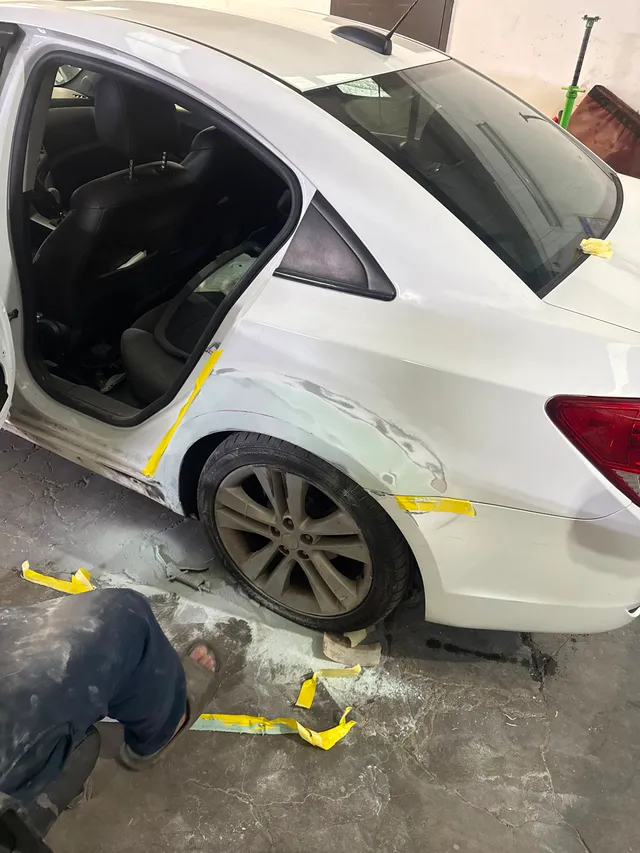 White sedan — spot before — Stop N Go auto body & paint, Stone Mountain GA