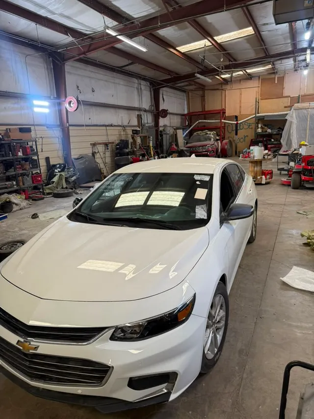White sedan — ceramic after — Stop N Go auto body & paint, Stone Mountain GA