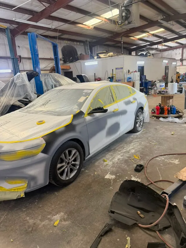 White sedan — painting progress — Stop N Go auto body & paint, Stone Mountain GA