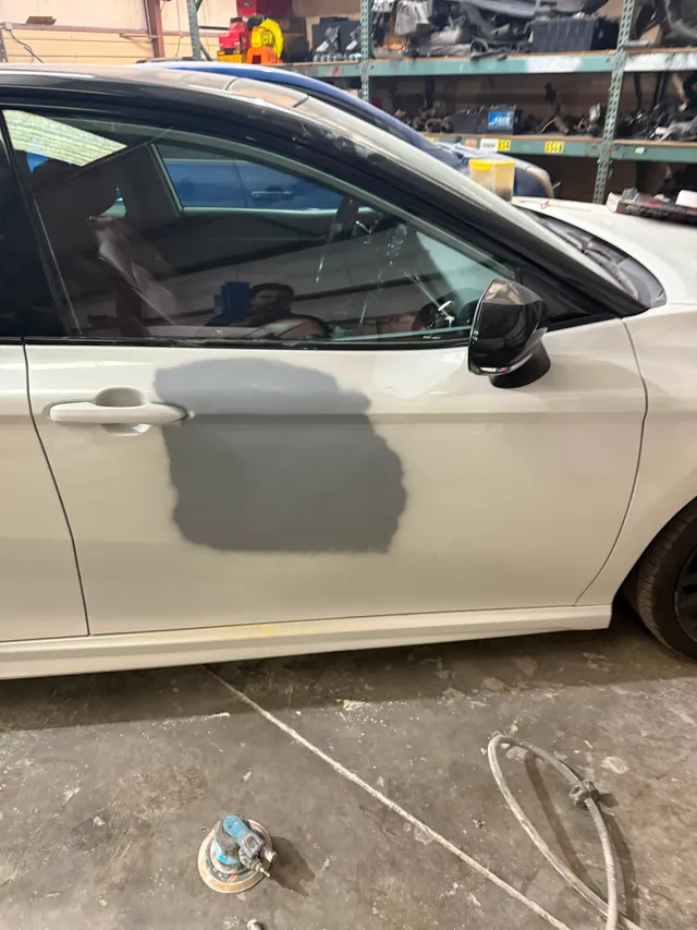 White sedan — spot before — Stop N Go auto body & paint, Stone Mountain GA