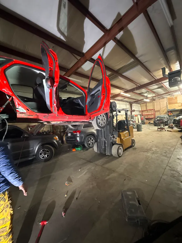 Red suv — collision progress — Stop N Go auto body & paint, Stone Mountain GA