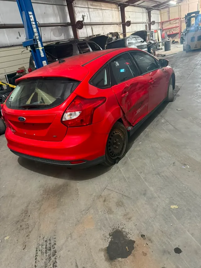 Red sedan — collision before — Stop N Go auto body & paint, Stone Mountain GA